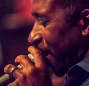 The Good Guys Blues Band, Vocalist close up on stage, Live Music